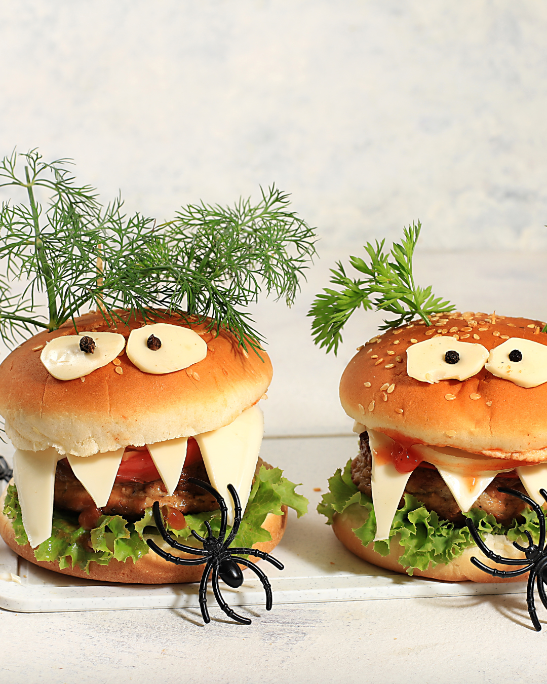 two sliders that are turned into monsters with fangs