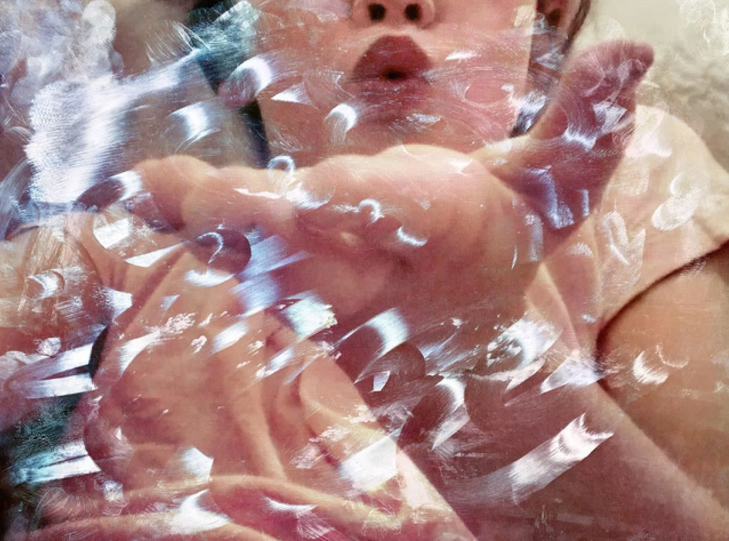 Photo of girl blowing a kiss on screen