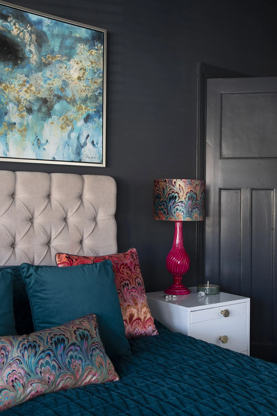 whitley-bay-bedroom-artwork-bedside-pink-lamp-detail -susi-bellamy-cushions.jpg