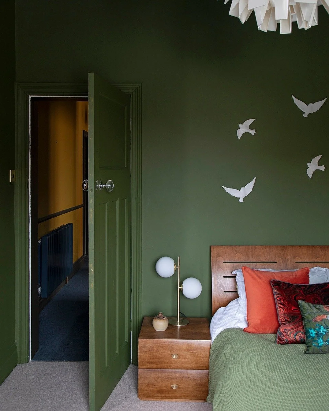 In our home, even the spare room is a sanctuary.

This room was designed to help guests truly relax when they stay over. Deep green wraps every surface, like being held by the countryside, while the light and air from the coast filter in through the 