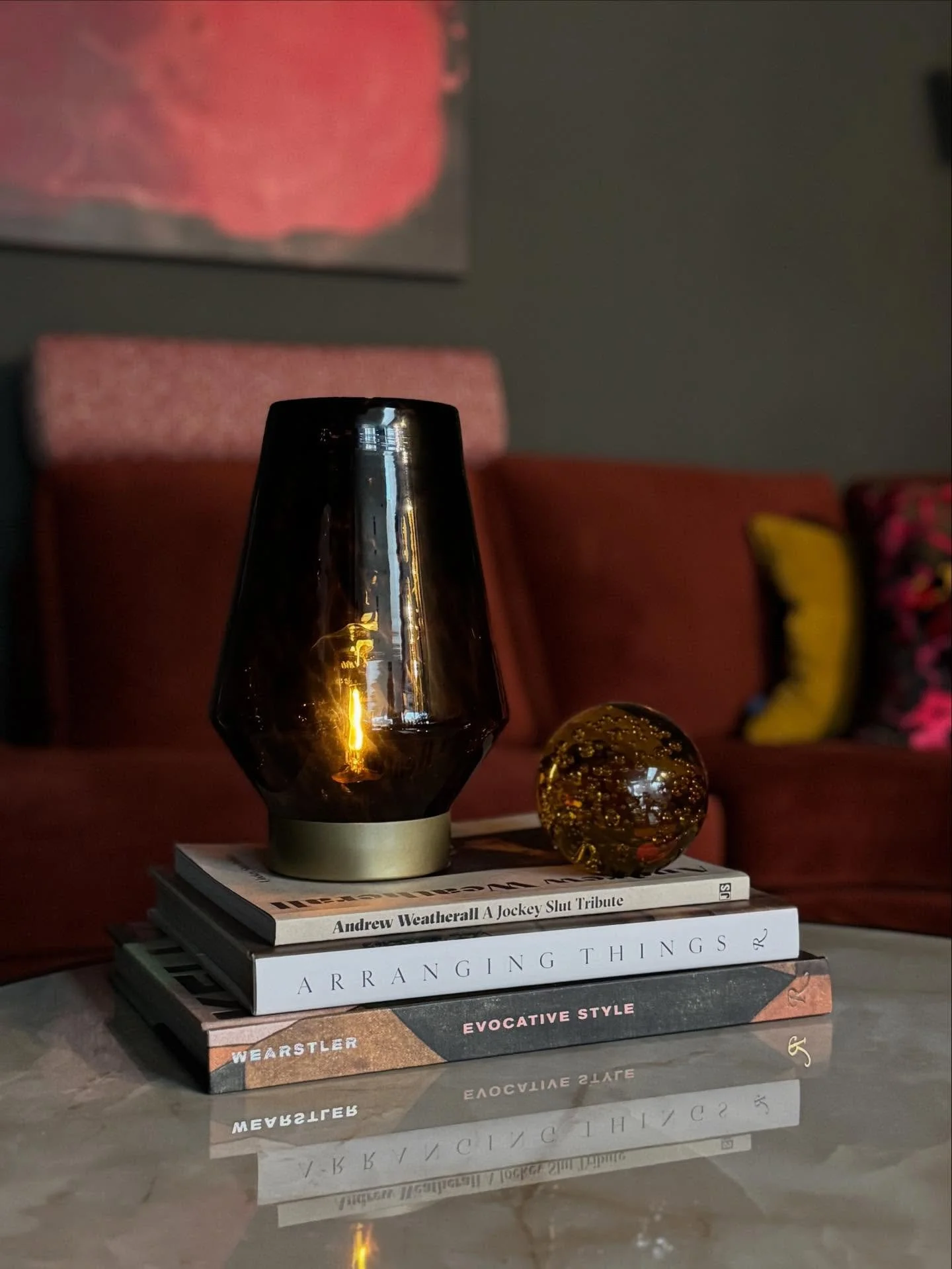 This year I&rsquo;m letting winter arrive quietly.

Not in a rush of decorations or a long to do list, but in small, steady shifts at home.

The lamp that goes on a little earlier.
Fresh flowers on the table.
A soft glow that says:
&ldquo;Today was e