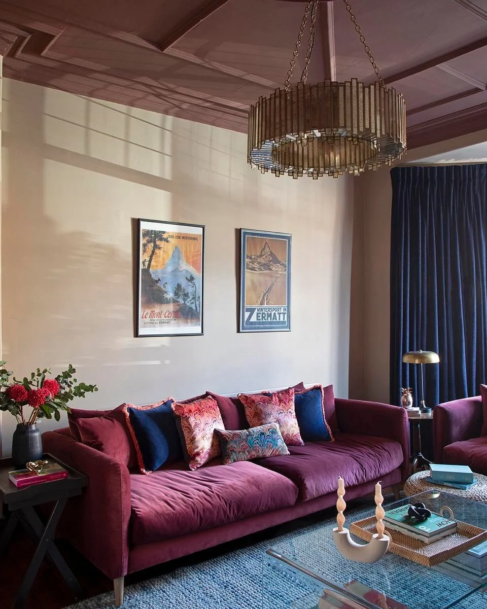 There is a particular kind of quiet that only arrives at this time of year.

The light softens, the evenings stretch out and the living room becomes the place everyone drifts back to.

In this room, we leaned into that feeling on purpose.
Deep berry 