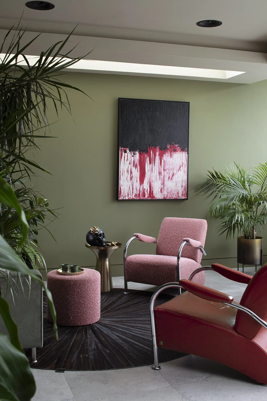 whitley-bay-dining-living-room-pink-chair-black-artwork.jpg