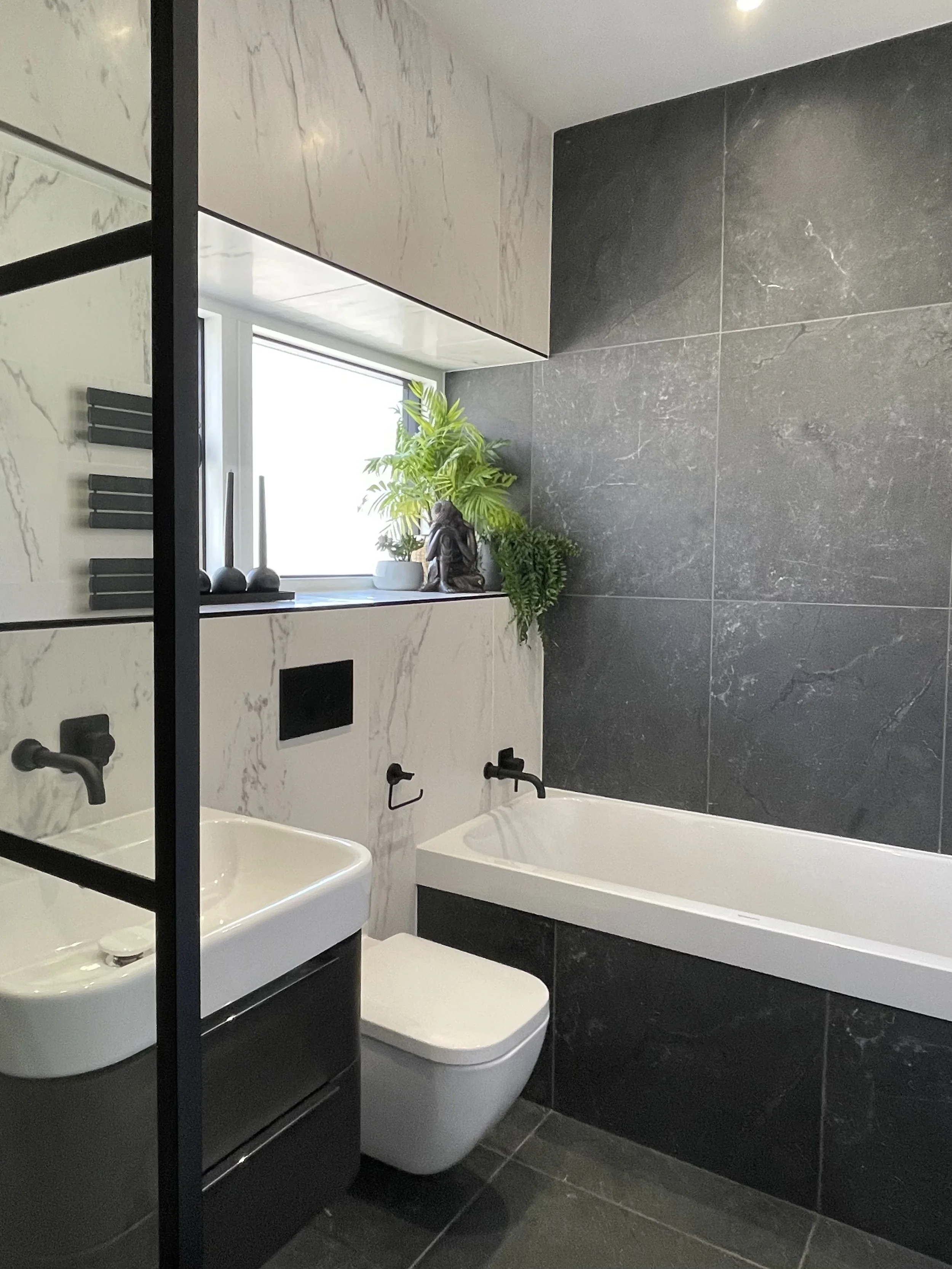 whitley-bay-bathroom-bath-shower-black-white-marble-tiles.jpeg