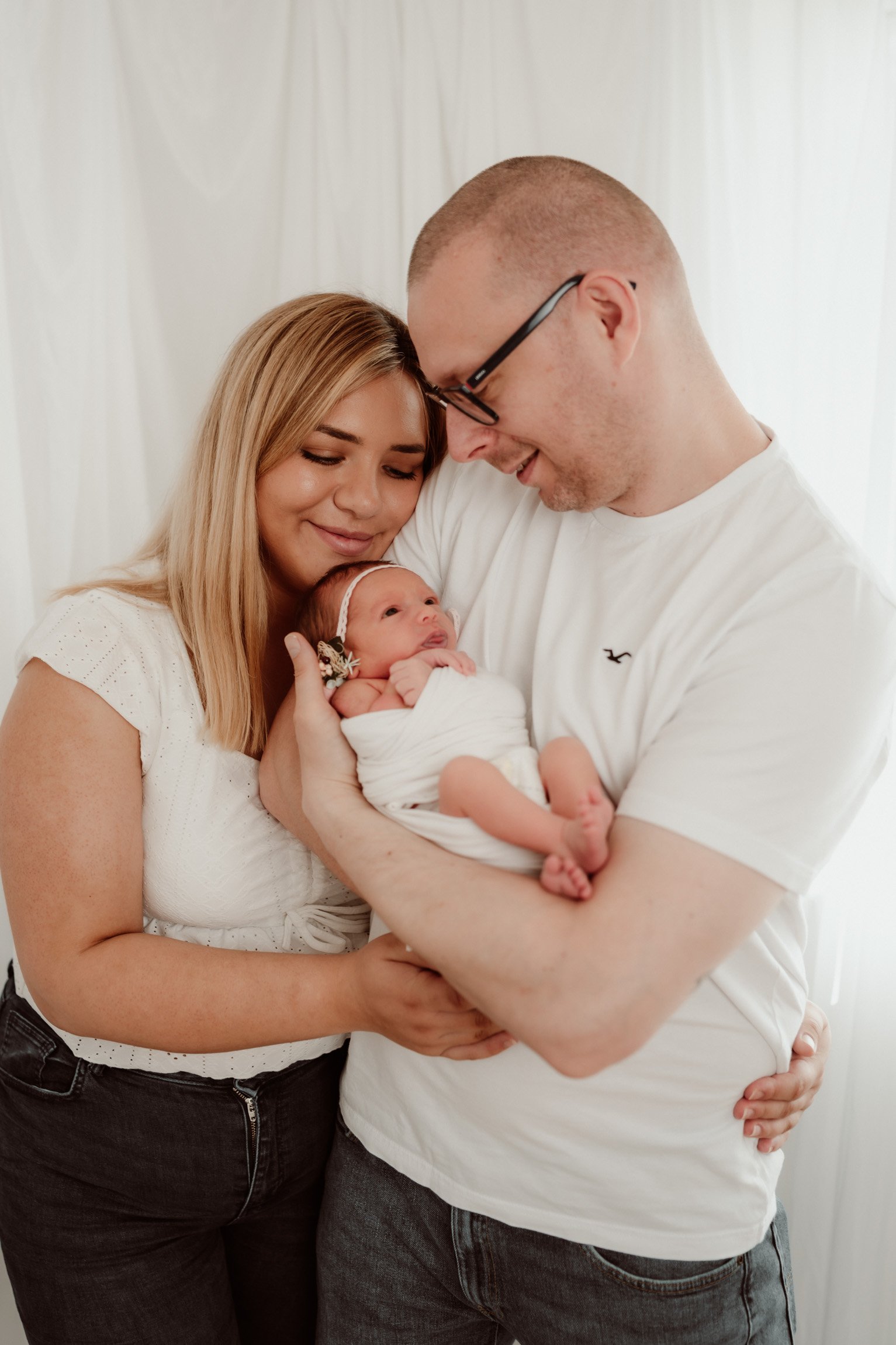 First Family Photos With a Newborn Baby