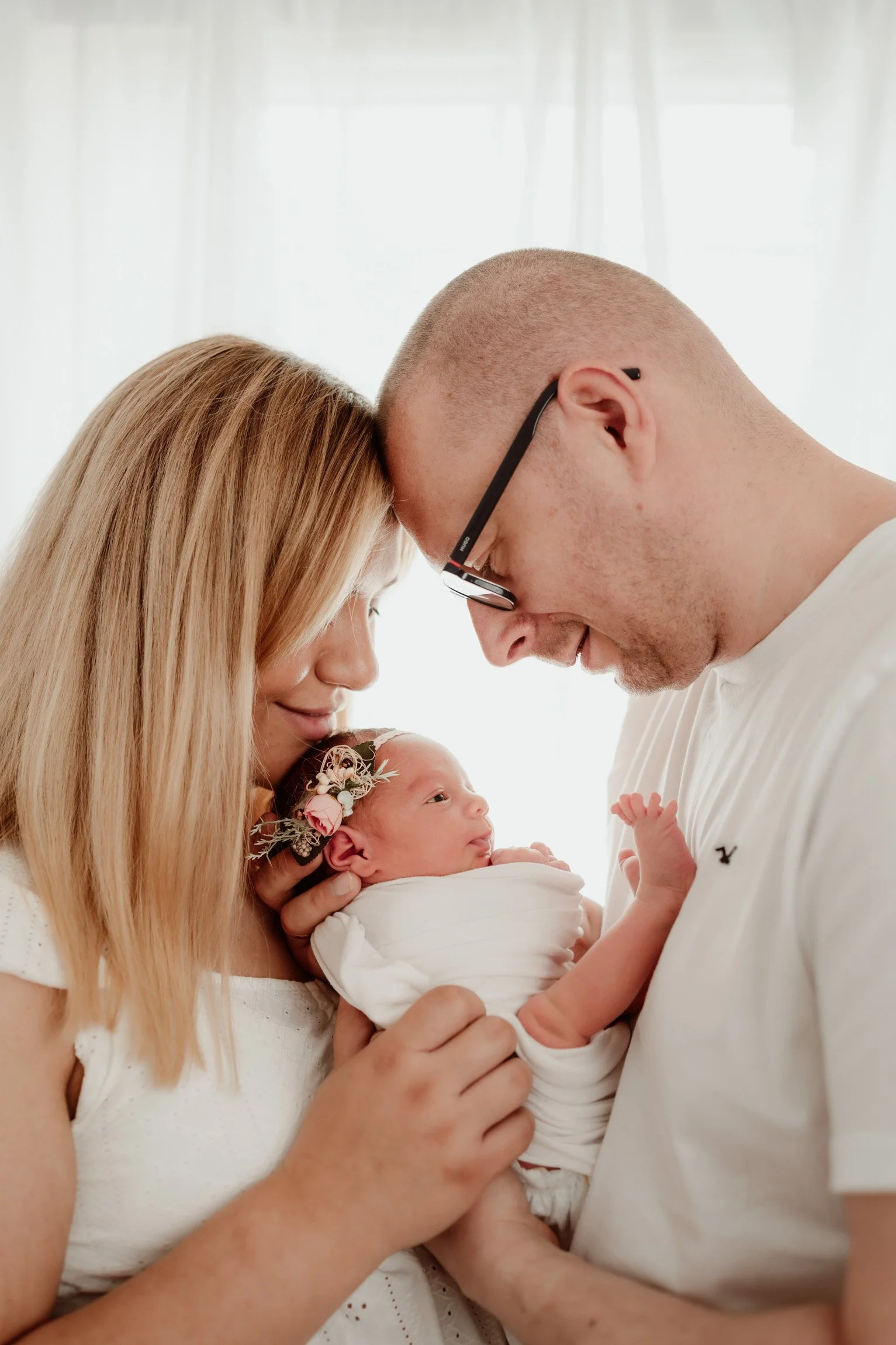 First Family Photos With a Newborn Baby