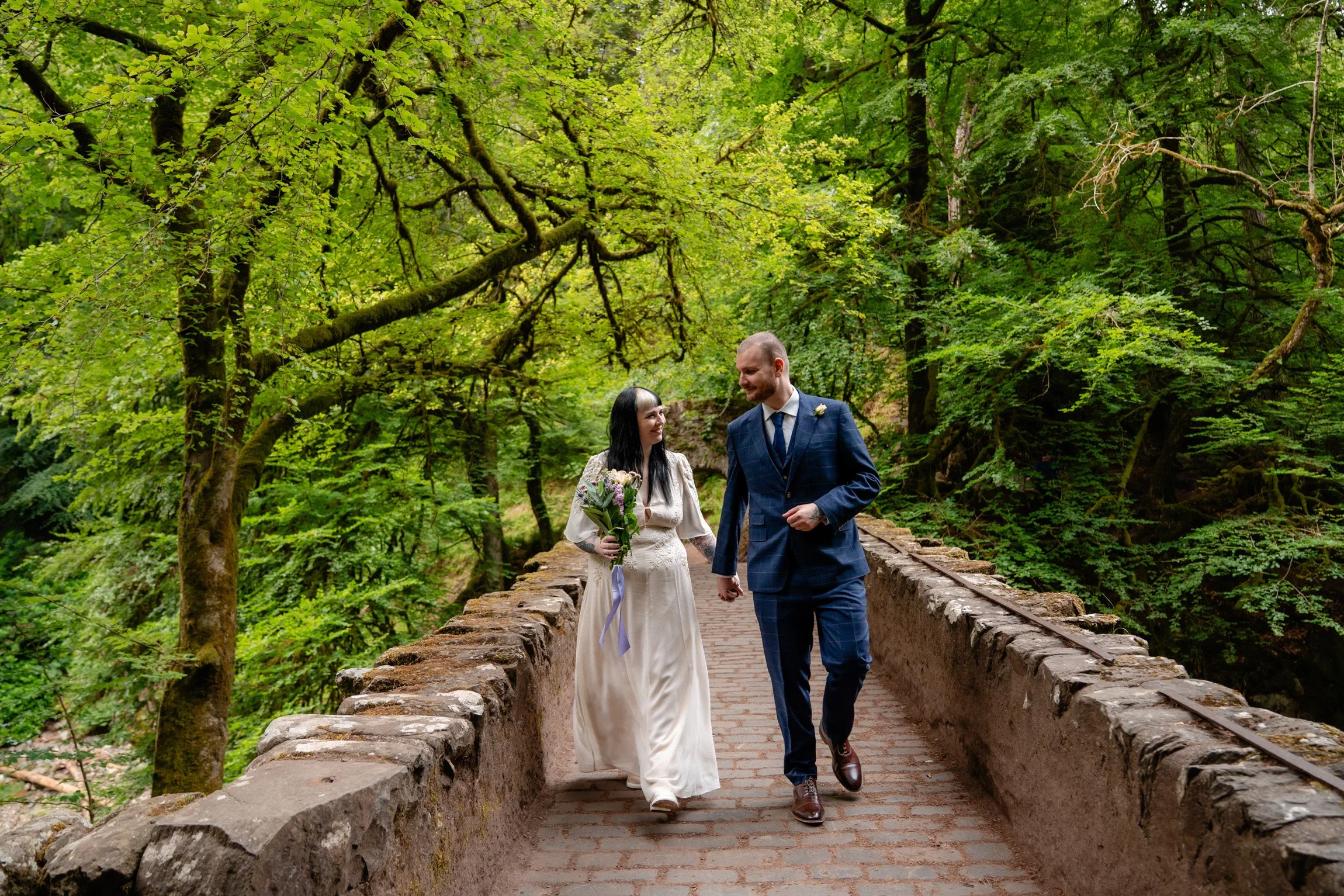 Couple Walking Across The Hermitage Bridge