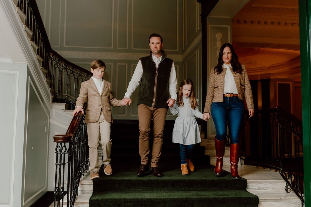 Family Walking Through Gleneagles Hotel