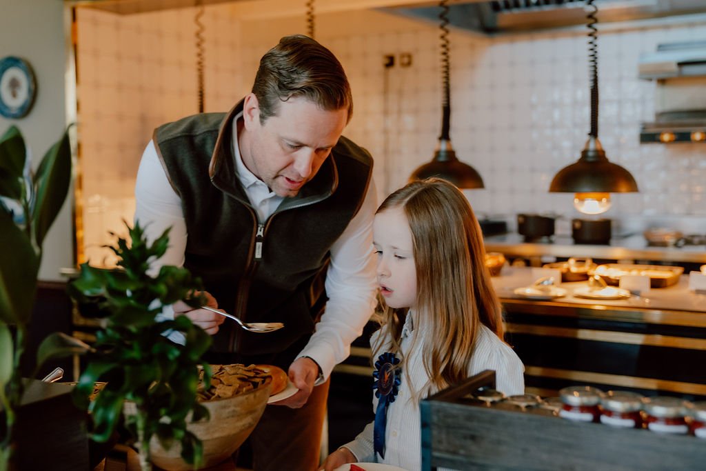 Father and Daughter Enjoying Breakfast at Gleneagles Hotel