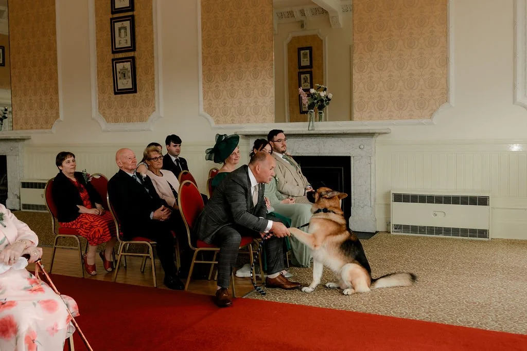 Intimate wedding ceremony with the couple, their dog and close family at Atholl Palace Hotel in Pitlochry