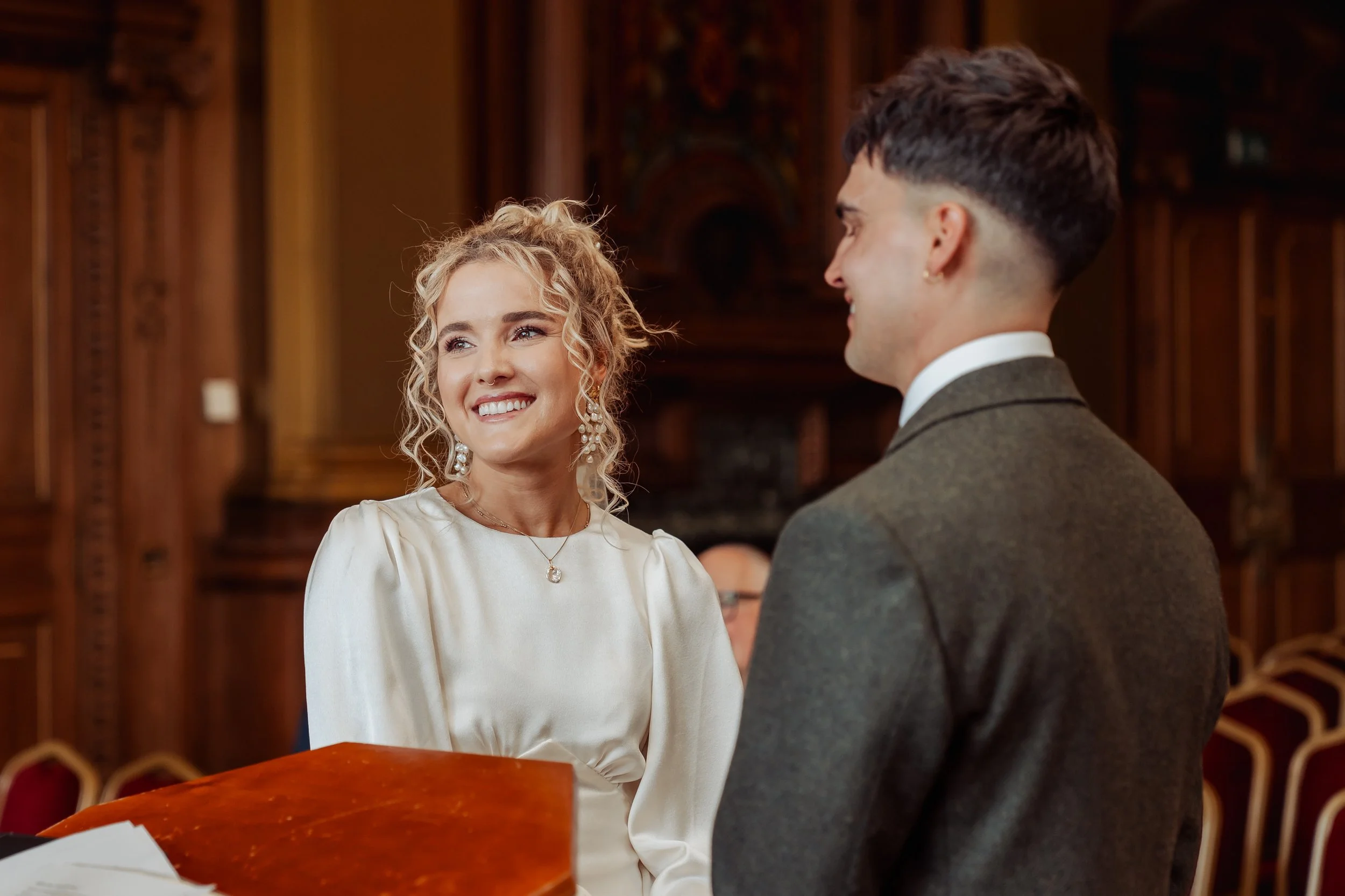 Edinburgh City Chambers wedding ceremony with warm historic interiors