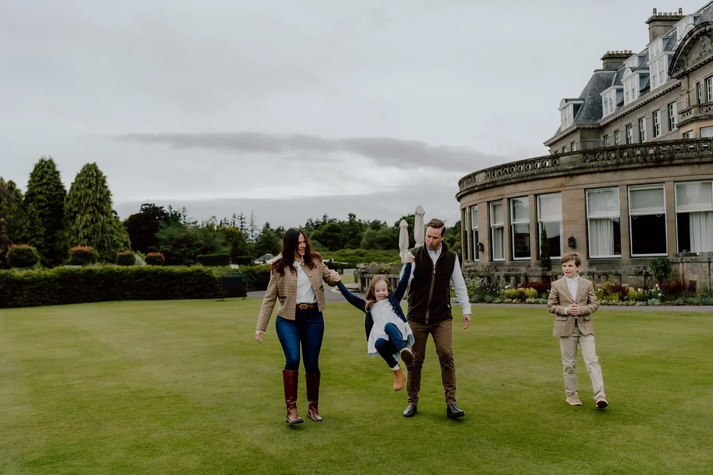 Family enjoying a relaxed photography experience on the grounds of Gleneagles Hotel in Scotland photographed by Patrice Little Photography