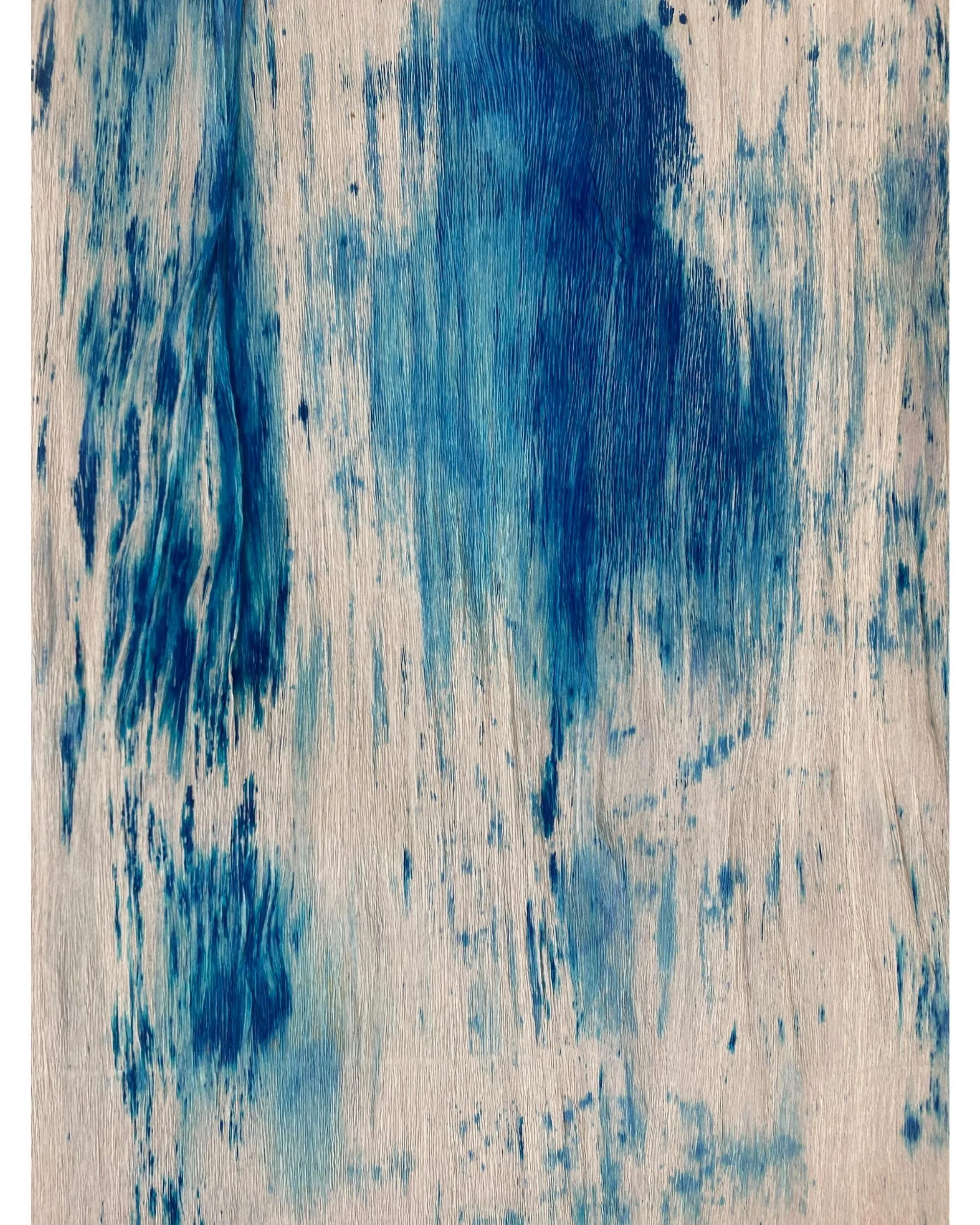 Abstract hand-dyed paper with organic deep blue and cream patterns, created through experimental dyeing techniques by Emmeli Kimhi