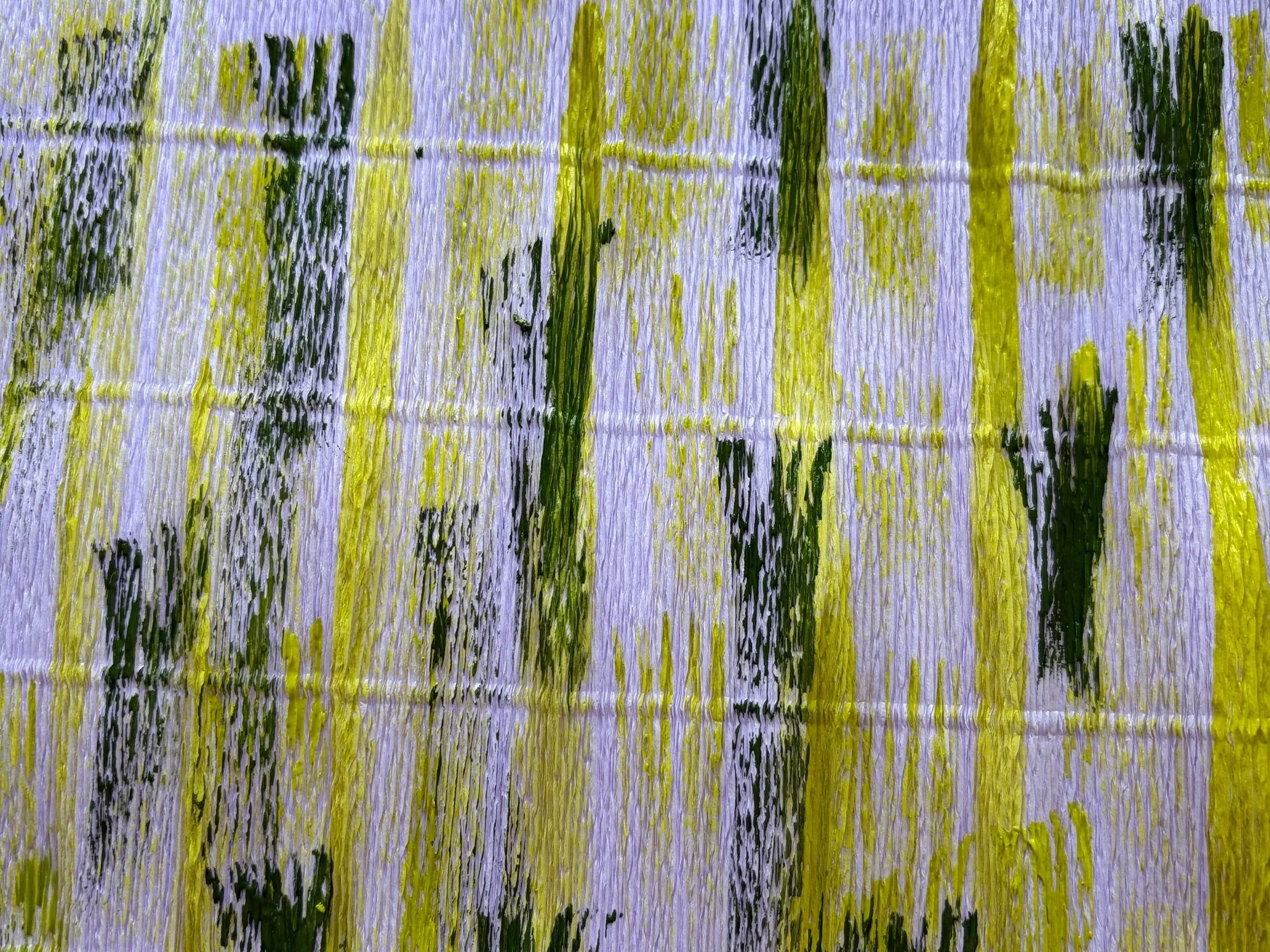 Close-up of hand-painted paper with delicate green and yellow watercolour textures on a pale grid base. Detail from the custom paper collection created for Studio Duggan’s The SpeakEasy Salon project.