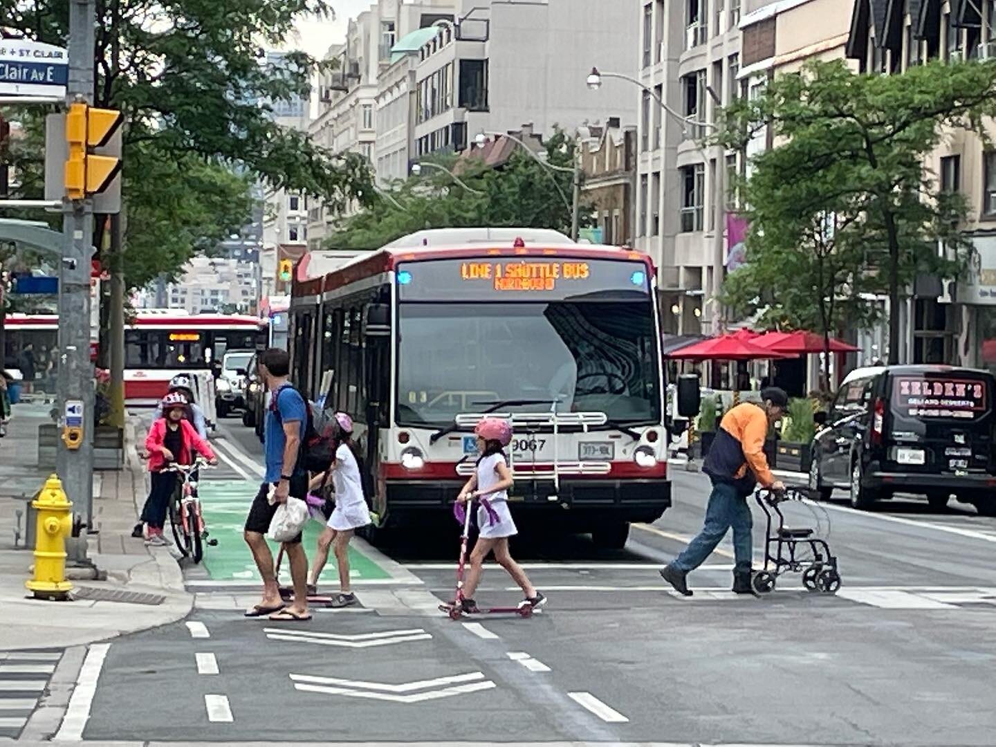 Love the complete street design at Yonge &amp; St. Clair! Safe &amp; comfortable infrastructure for young and old, whether they walk, roll, take transit, or drive. 😊