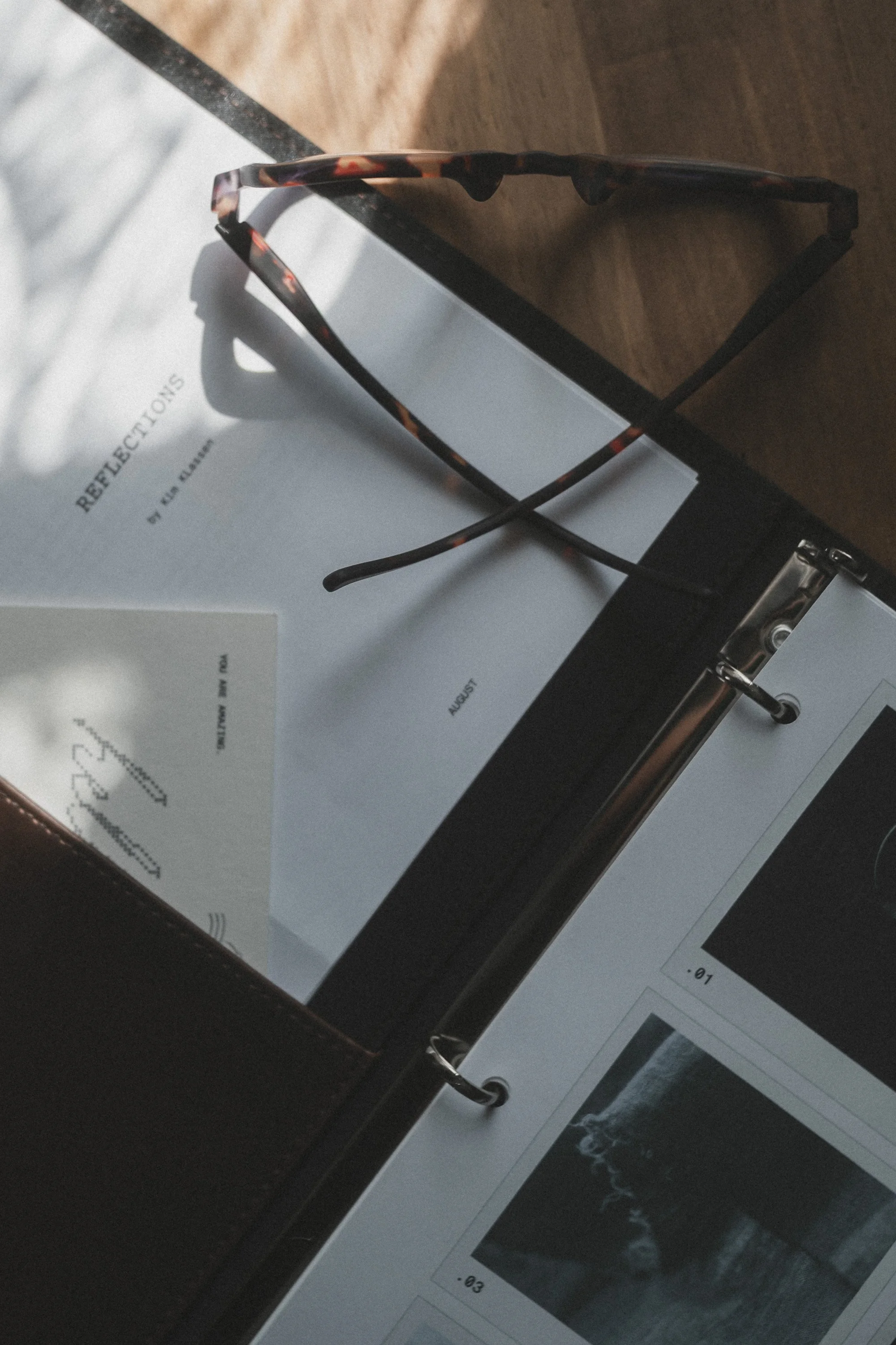 reflections-binder-and-glasses-kim-klassen-20260826-kkf5450.jpg