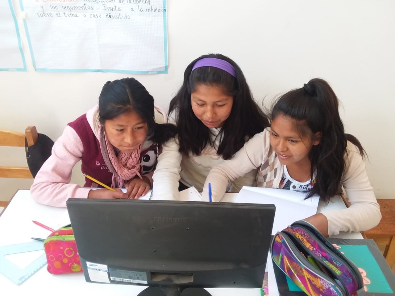 girls working at a computer at the Sacred Valley Project.jpg