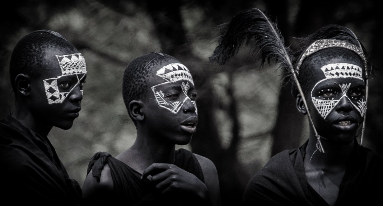traditional Maasai people white face paint.jpg