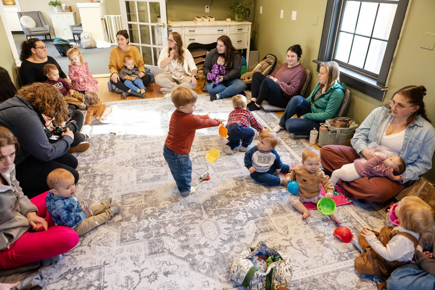 Mom support group with moms sitting in a circle