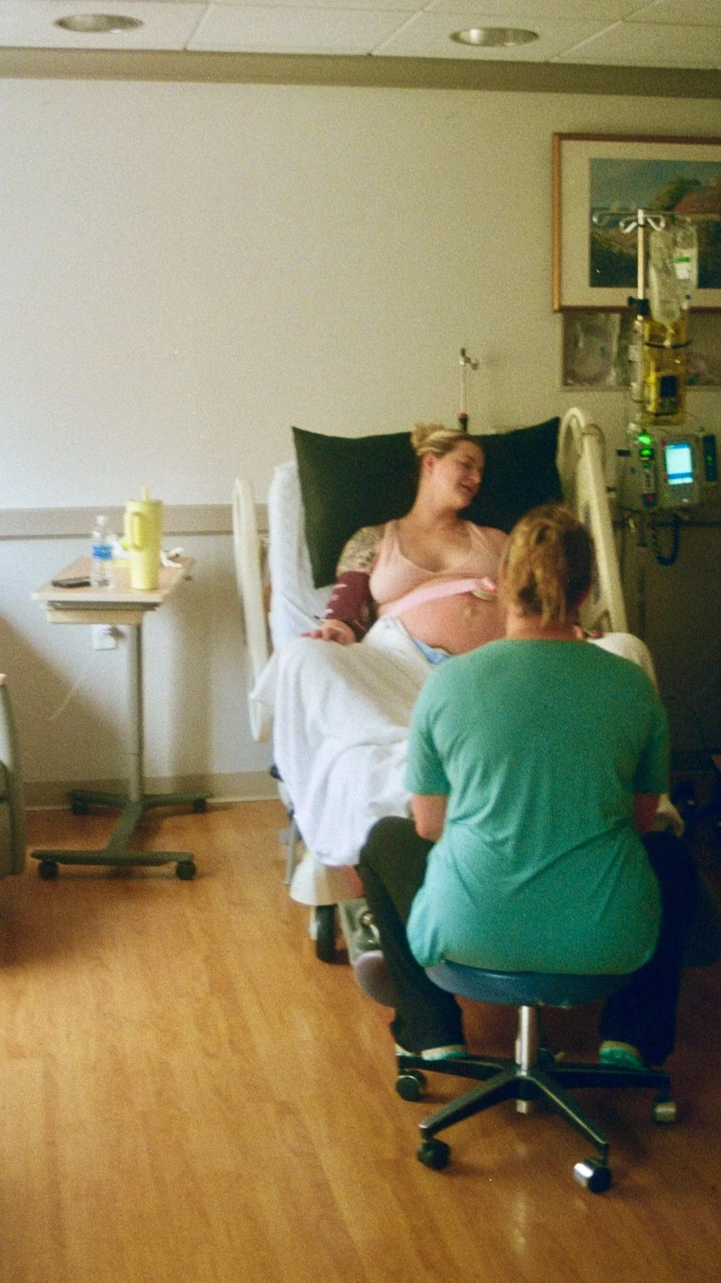 Birth doula supporting client in the immediate postpartum