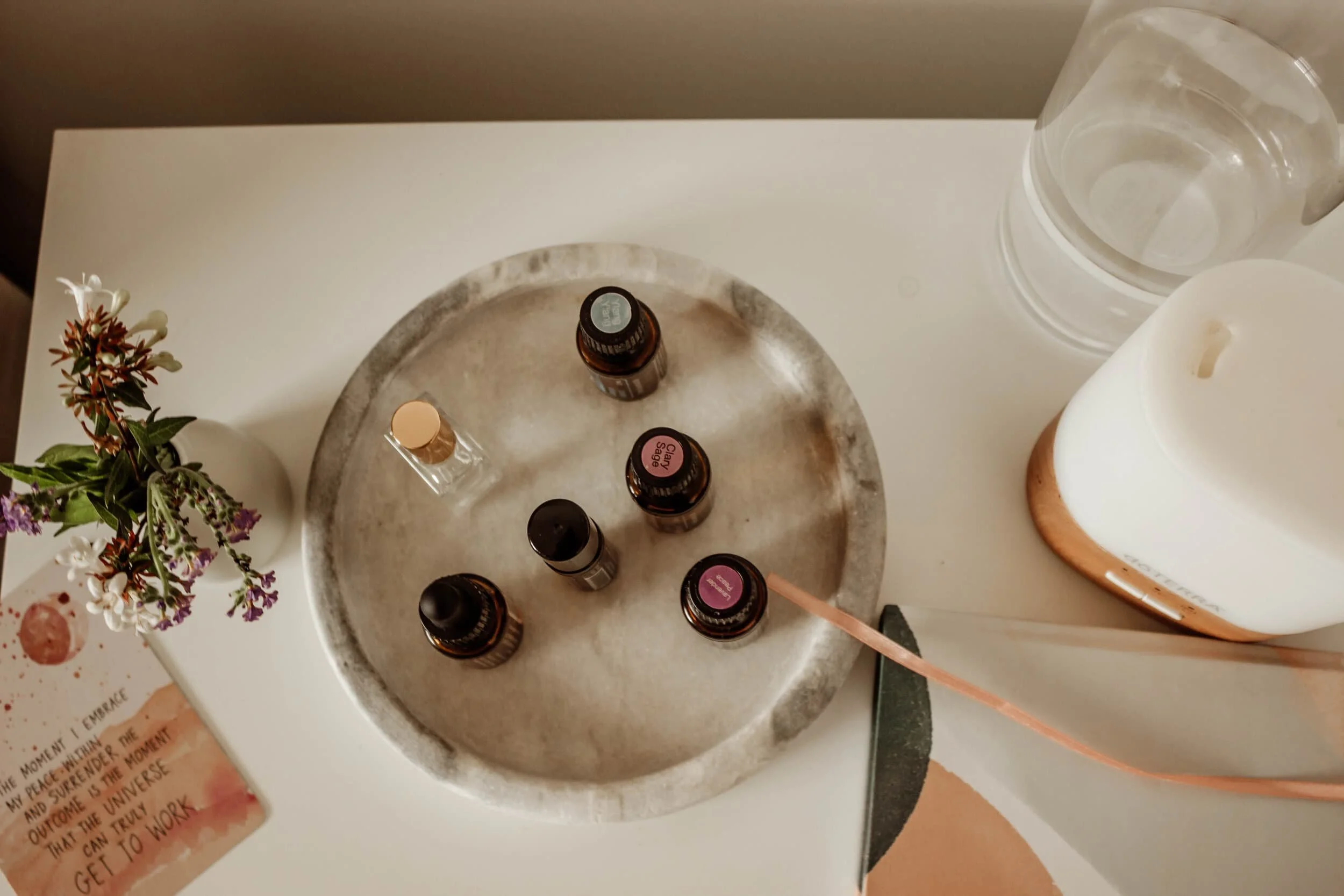 Essential oils and aromatherapy supplies arranged for a relaxing bedtime routine to support better sleep and overall wellness.