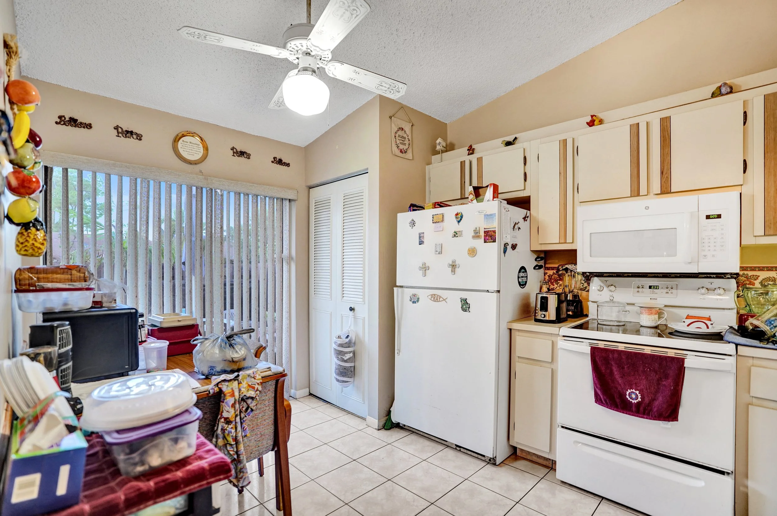 633 Sea Pine Way H, Greenacres Waterfront Villa For Sale | Pine Ridge Community