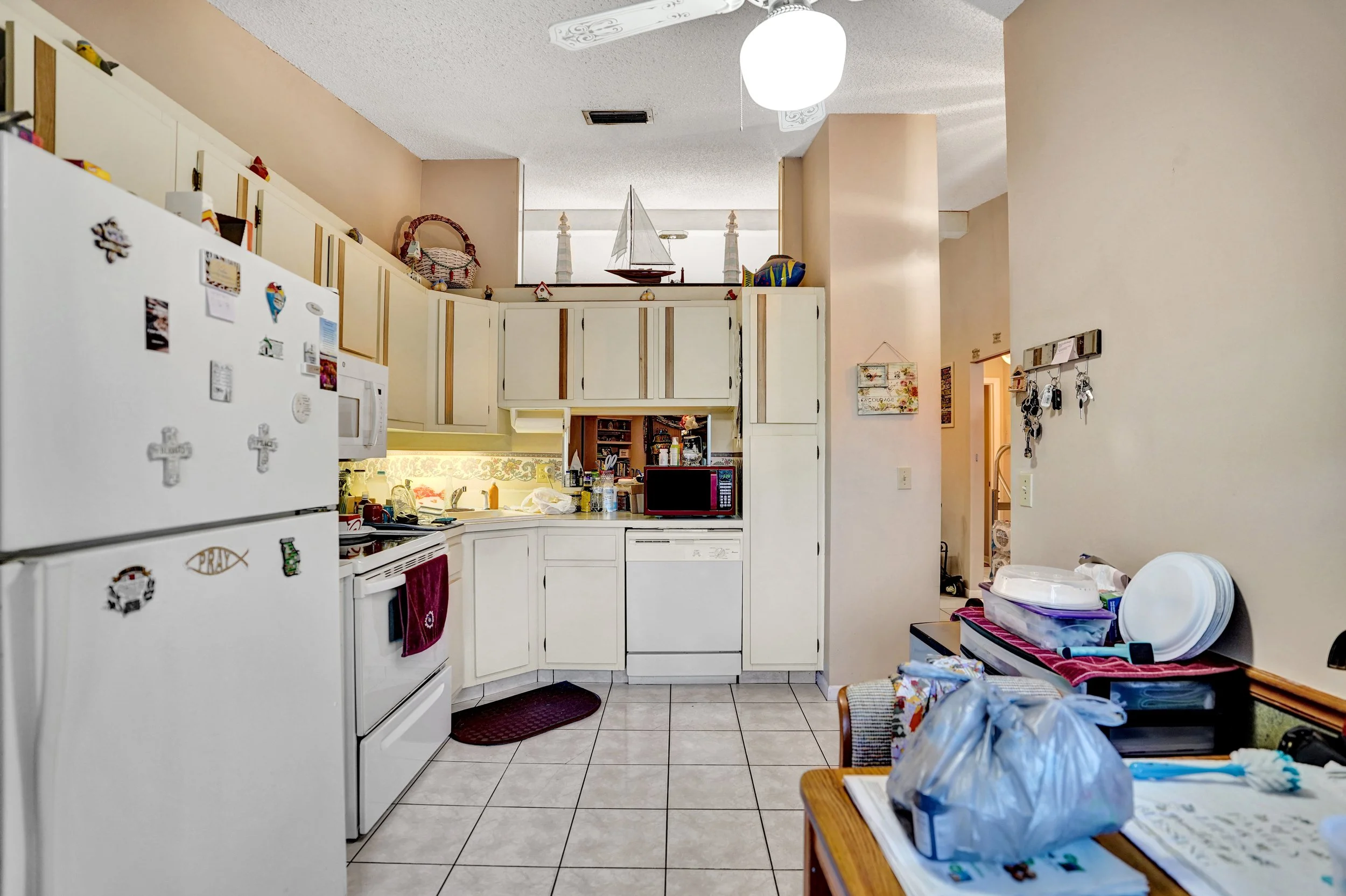 633 Sea Pine Way H, Greenacres Waterfront Villa For Sale | Pine Ridge Community