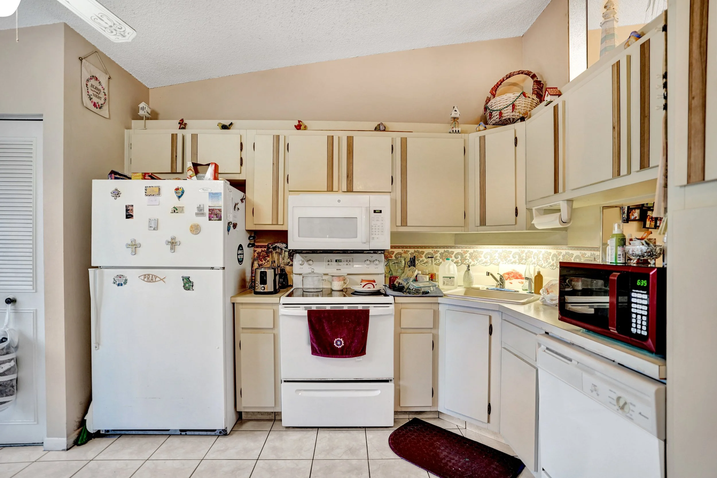 633 Sea Pine Way H, Greenacres Waterfront Villa For Sale | Pine Ridge Community