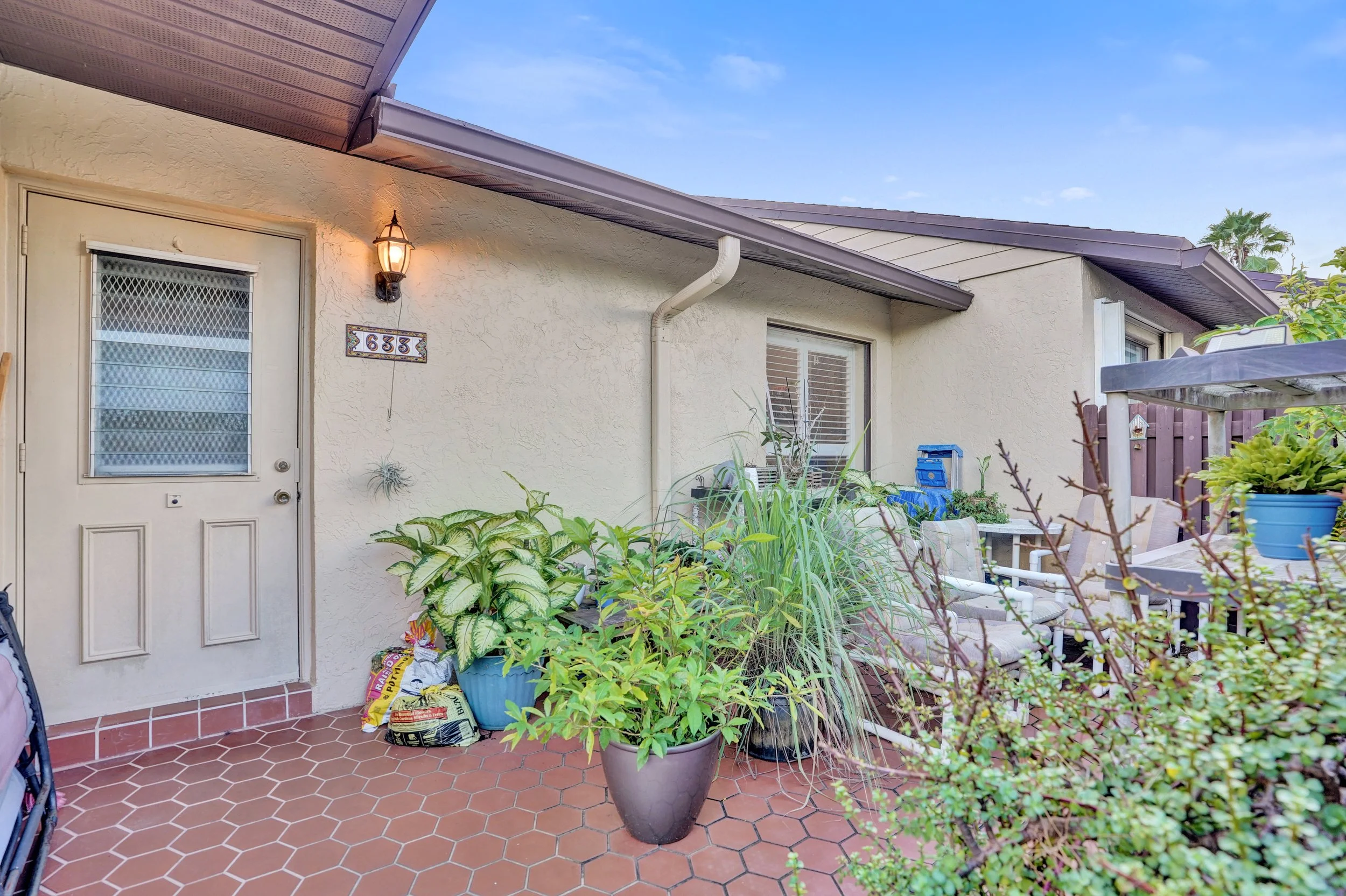 633 Sea Pine Way H, Greenacres Waterfront Villa For Sale | Pine Ridge Community
