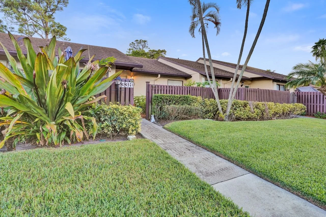633 Sea Pine Way H, Greenacres Waterfront Villa For Sale | Pine Ridge Community