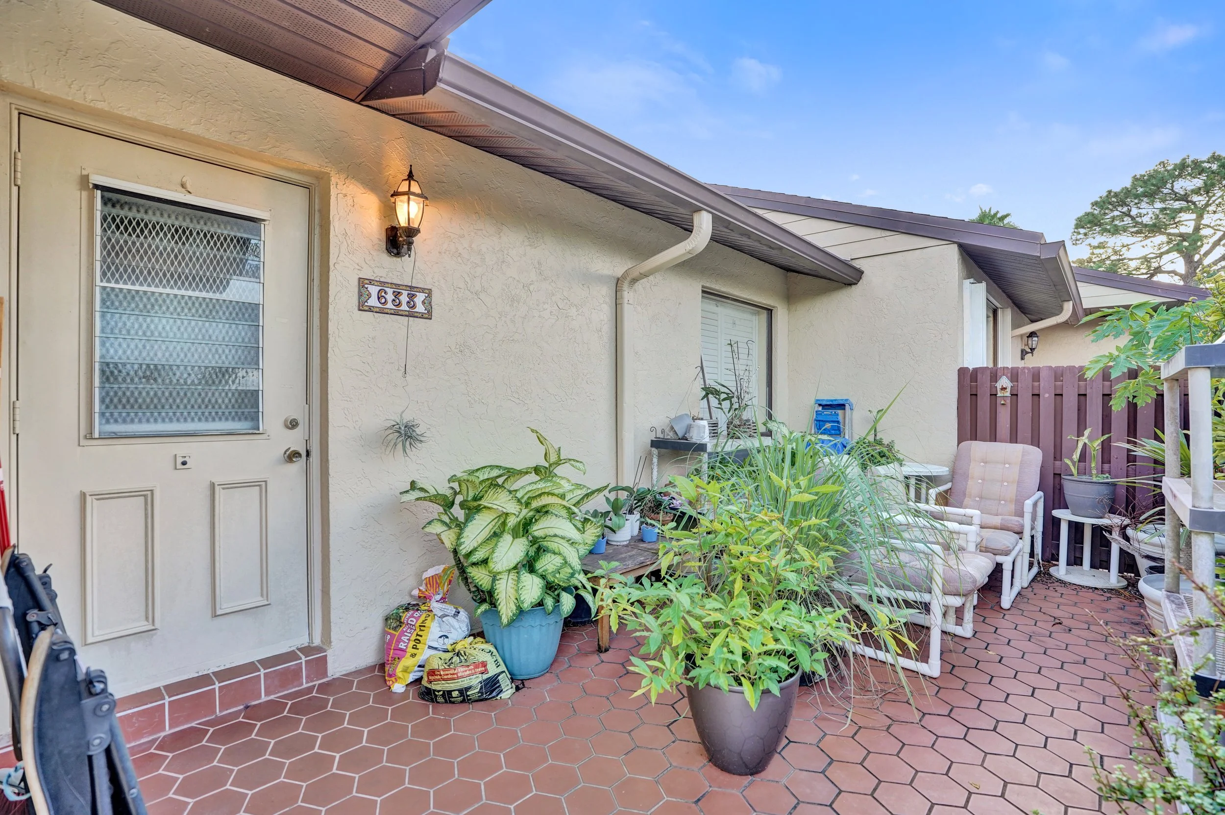 633 Sea Pine Way H, Greenacres Waterfront Villa For Sale | Pine Ridge Community