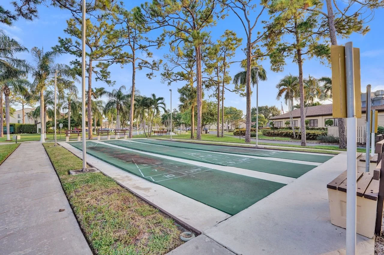 633 Sea Pine Way H, Greenacres Waterfront Villa For Sale | Pine Ridge Community