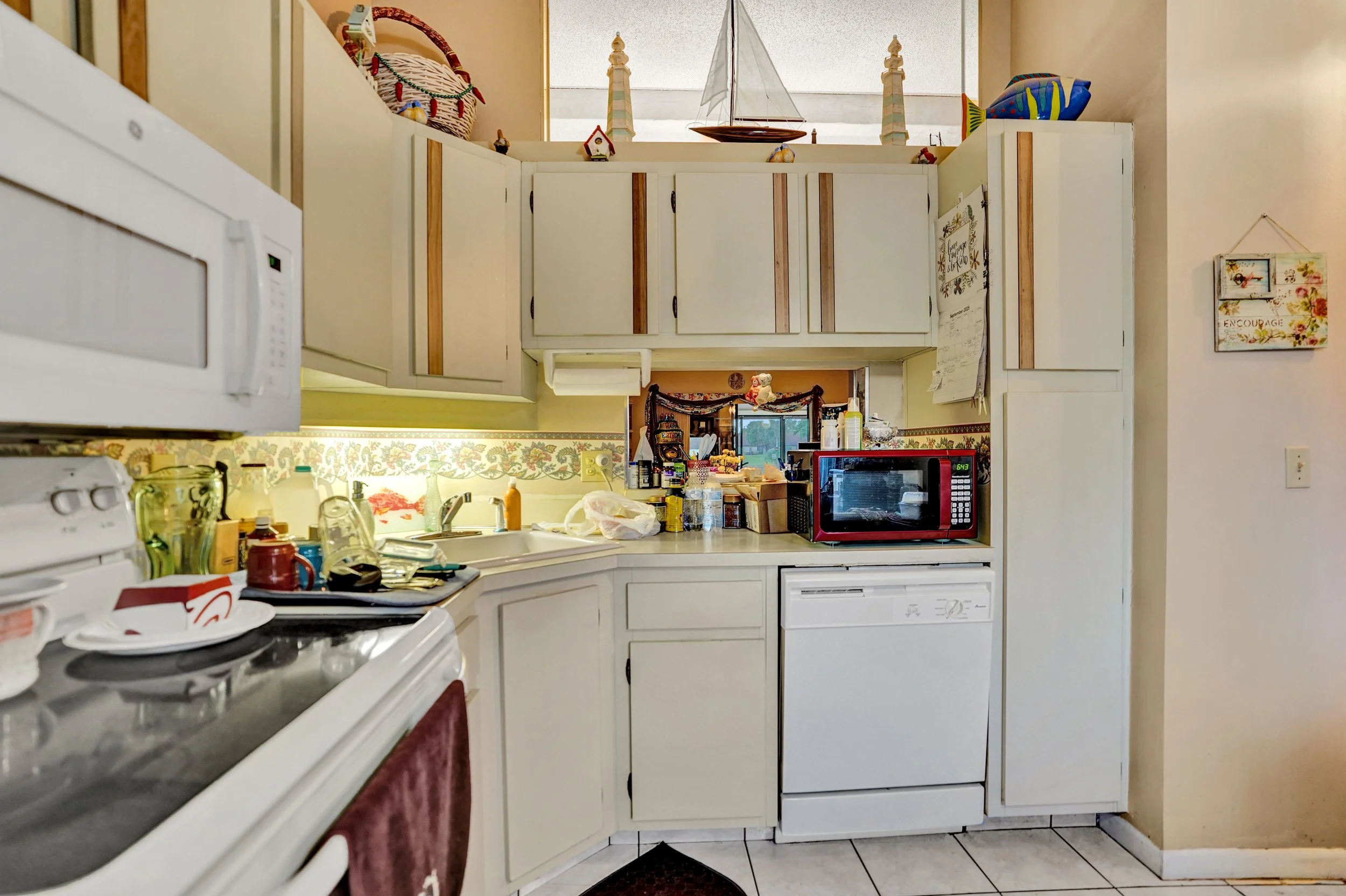 633 Sea Pine Way H, Greenacres Waterfront Villa For Sale | Pine Ridge Community