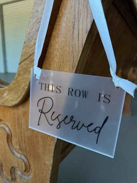 "This Row is Reserved" Sign