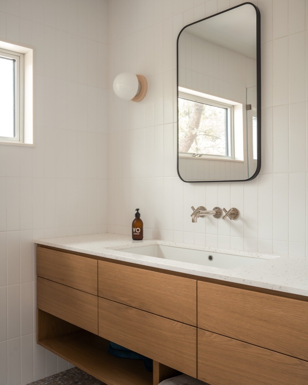 New primary bathroom at our Michigan Street House #renovation and #addition as featured in the @nytimes - more at link in bio

📸 @atanz 

#beachhouse #modernbeachhouse #moderninterior #moderndesign #modernarchitecture #homedesign #homeinspiration #b