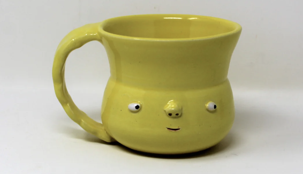 Nikki Lau yellow mug.png