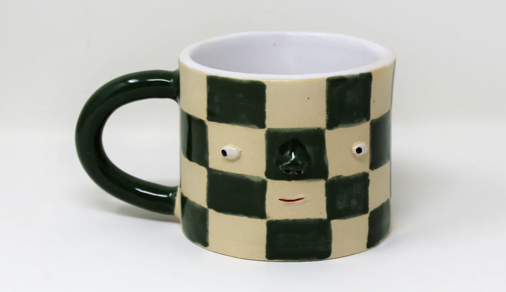 nikki lau checkered mug.png