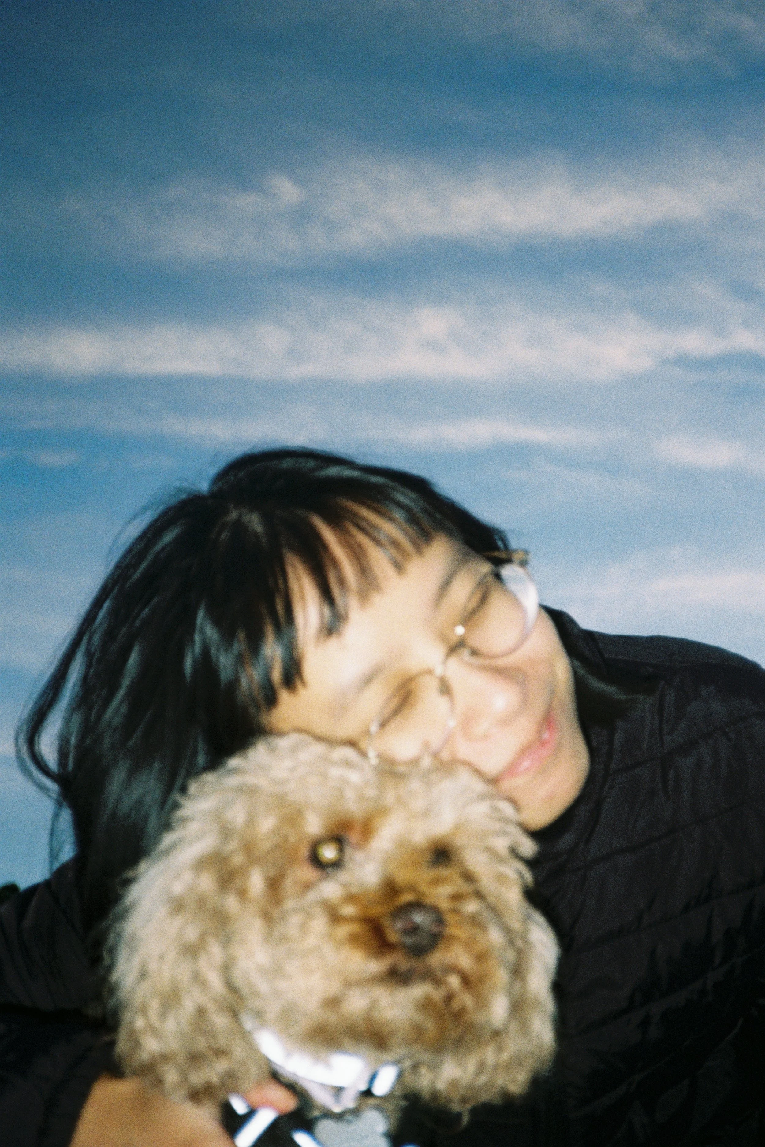 out of all the photos I have taken in my life, this is my favourite one! It's of my friend Jeannine and her dog Daisy. 