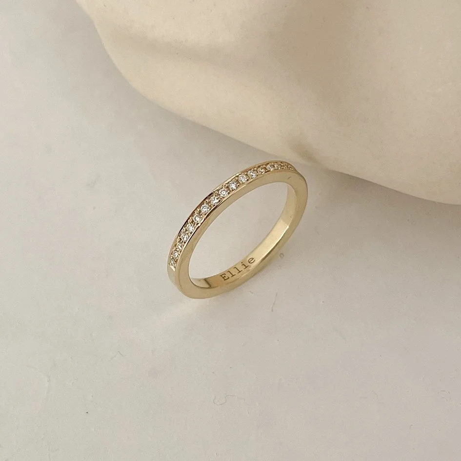 Modern wedding ring with small diamonds, Antwerp 