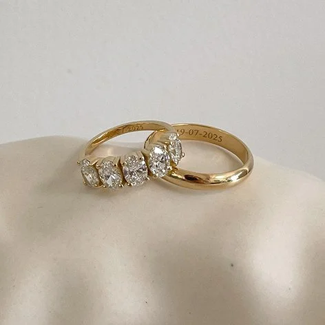 Big bold oval diamond eternity wedding ring in sustainable gold, crafted by De Vree in Antwerp