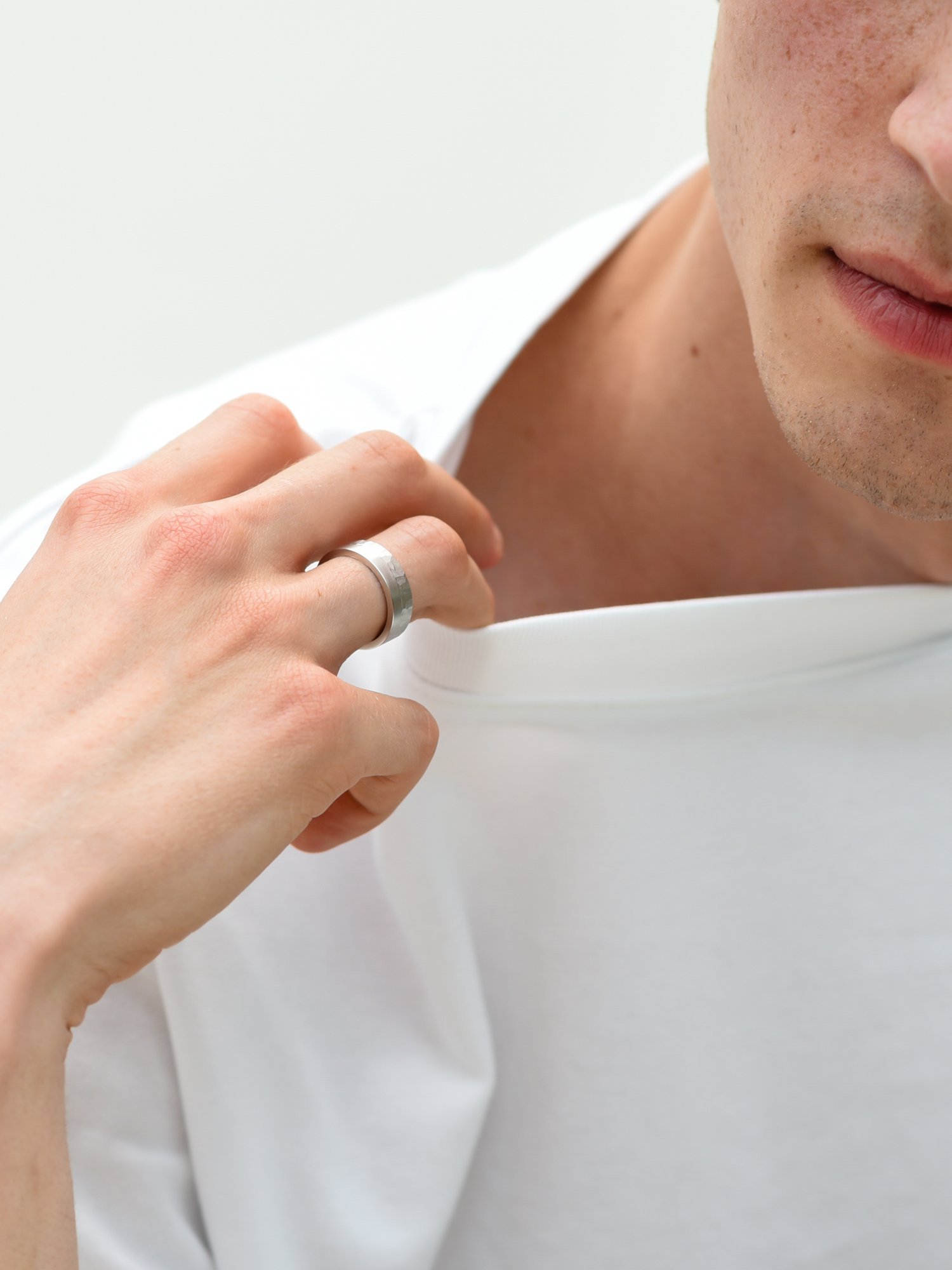 Modern engagement ring for men without diamonds or gemstones in white gold