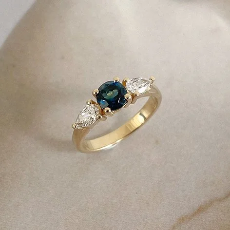 Engagement ring with diamonds and gemstone in recycled gold