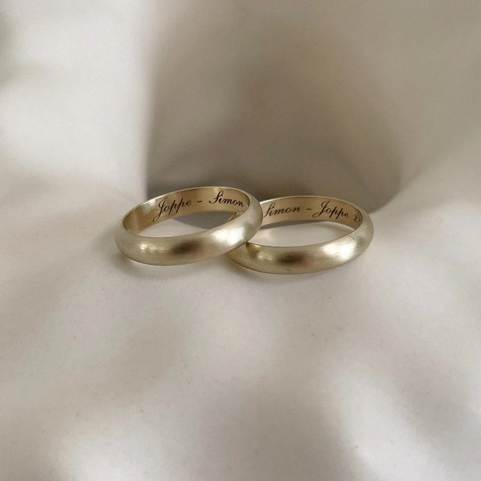 Half-round classic wedding bands in 14-karat yellow gold