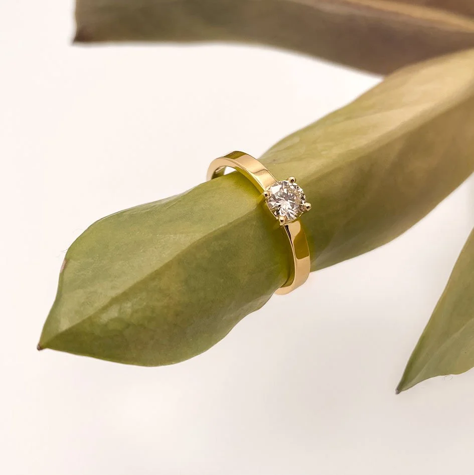 18K recycled yellow gold engagement ring with a 0.5c lab grown round diamond