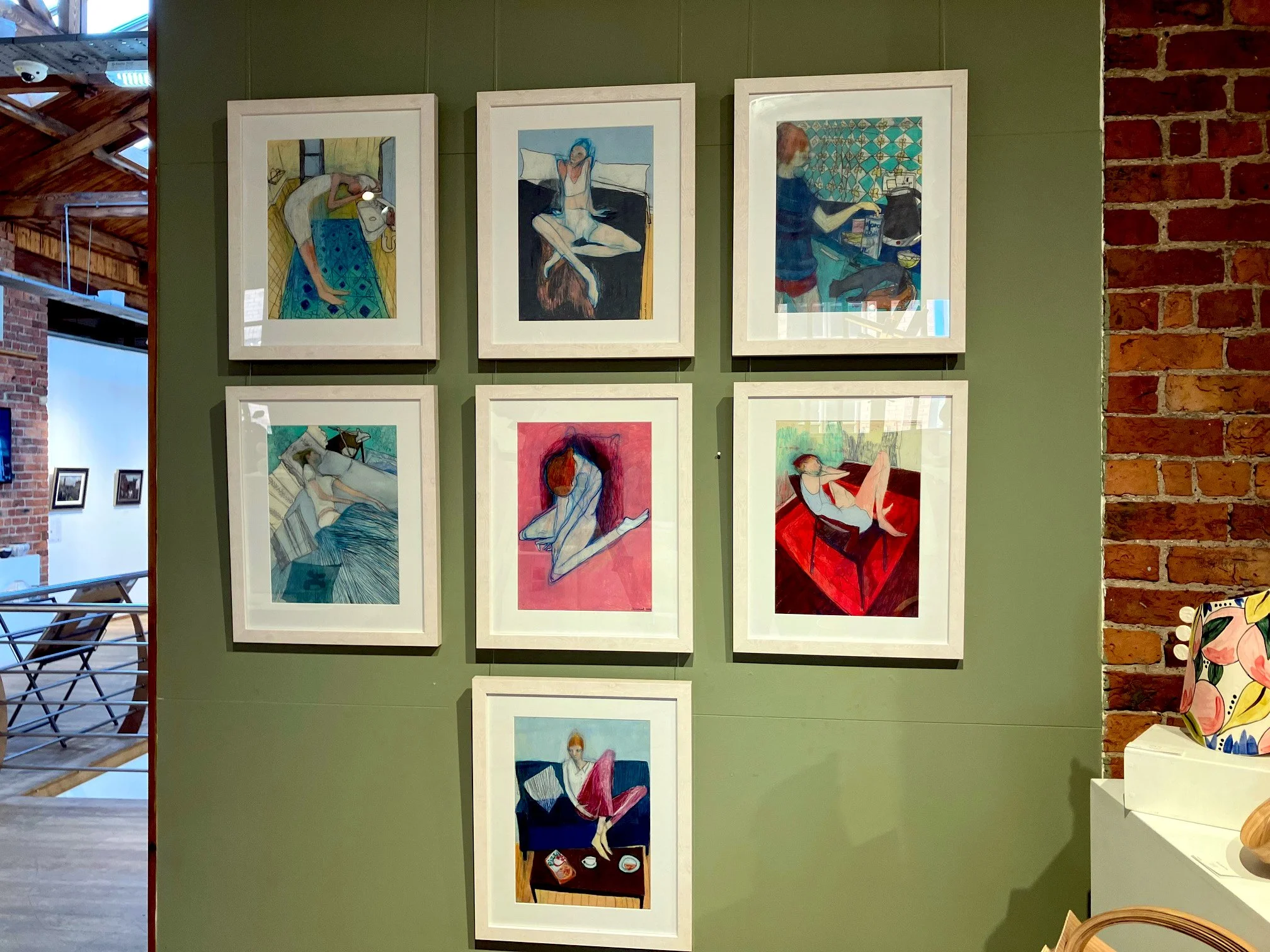 Installation view of seven contemporary figurative drawings by Alex Pascual exhibited at The Biscuit Factory, Newcastle, UK.