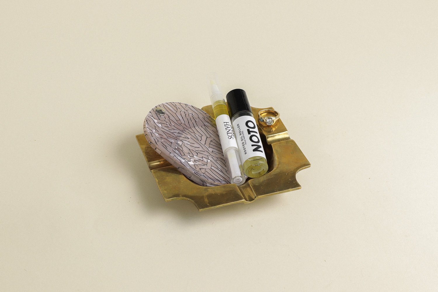 Vintage square solid brass ashtray with four notches. Weighty with a lovely natural patina.