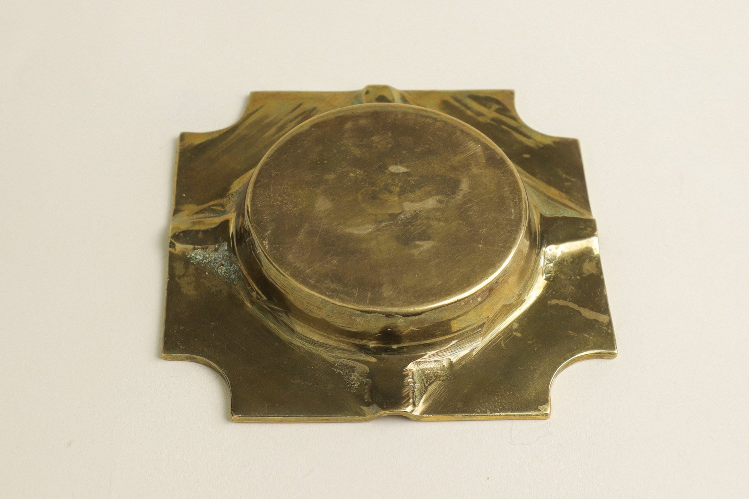 Vintage square solid brass ashtray with four notches. Weighty with a lovely natural patina.