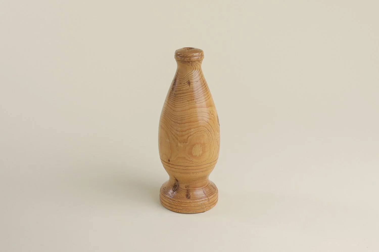 Vintage hand-turned spruce wood bud vase. Signed on the bottom by the maker R. Cooper, dated 3/10/96.