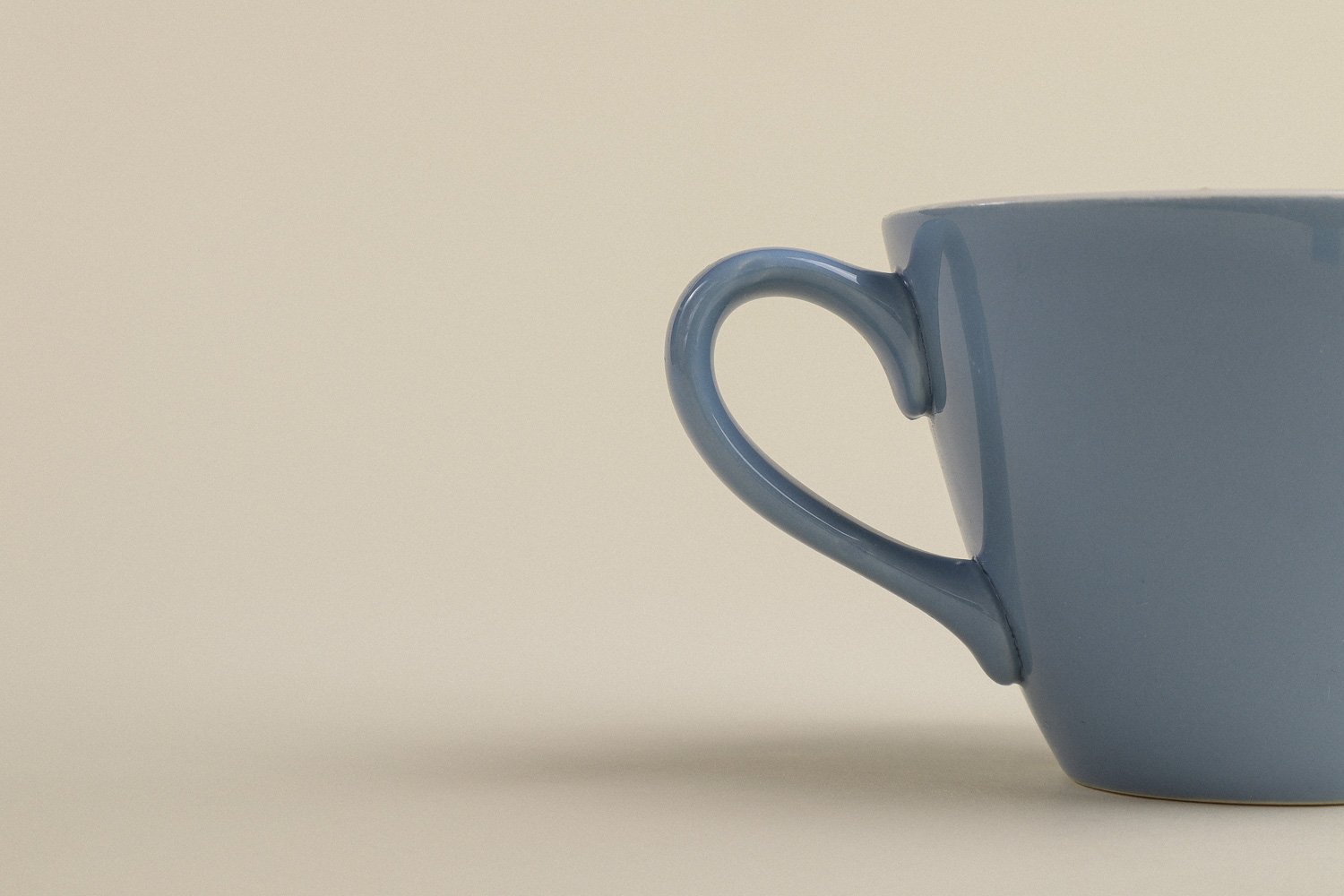 Set (4) of vintage mid-century teacups in a beautiful shade of sky blue with white interiors.