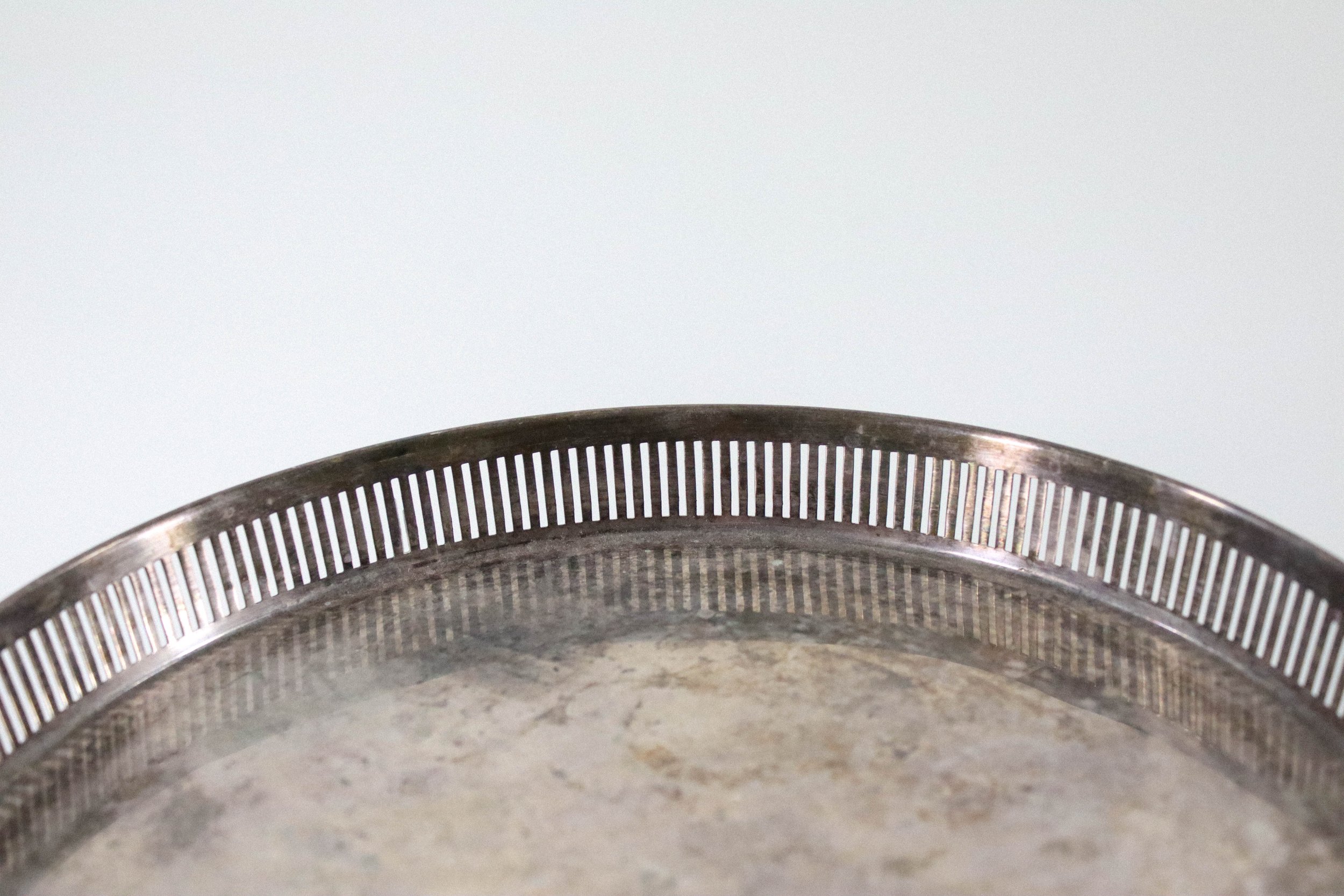 Vintage Reed & Barton round silver tray with handles.